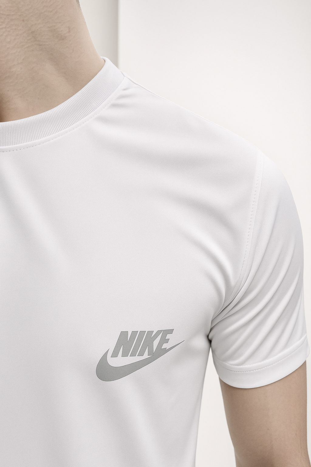 Nik White Drifit T-Shirt. Super Soft and Comfy